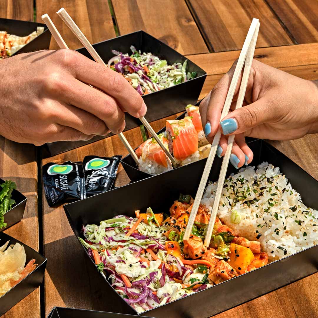 People Sharing Sushi Kabar