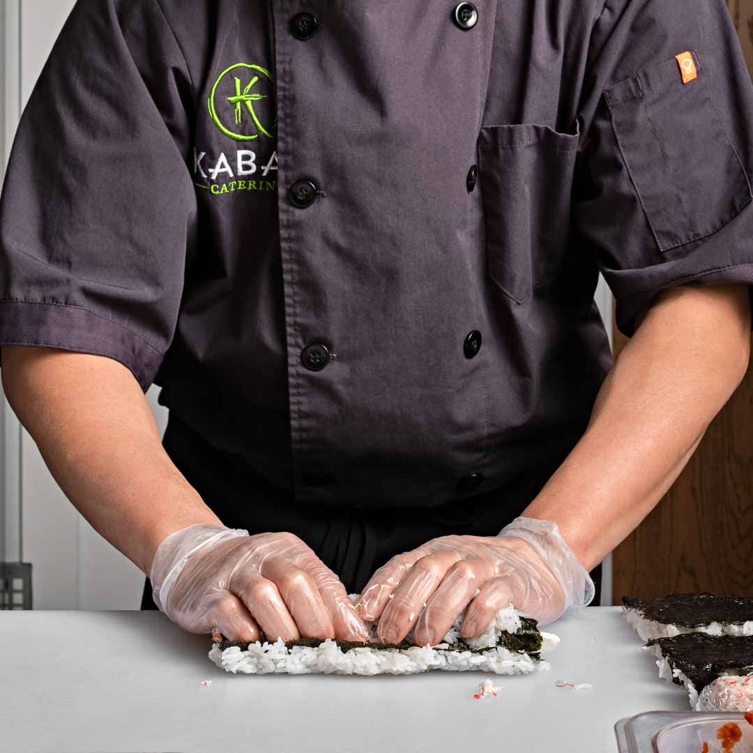 Sushi Kabar Chef Rolling Sushi